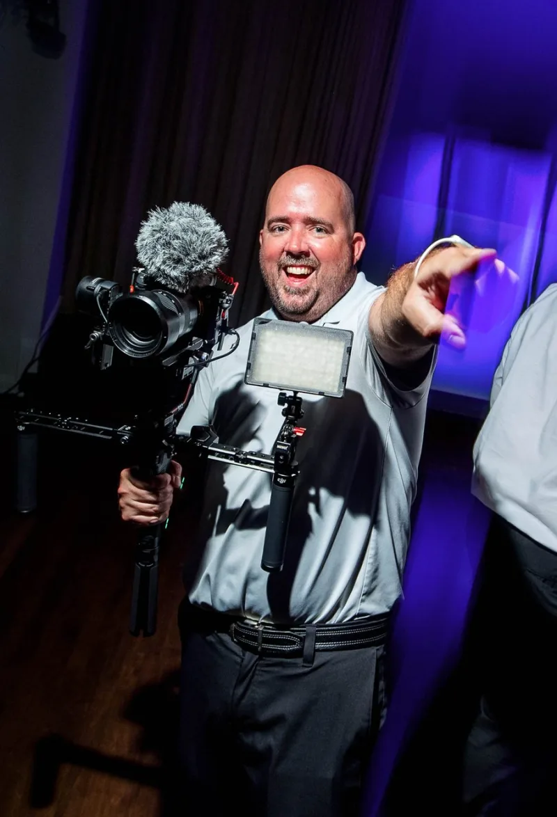 Austin Olsen filming a wedding reception