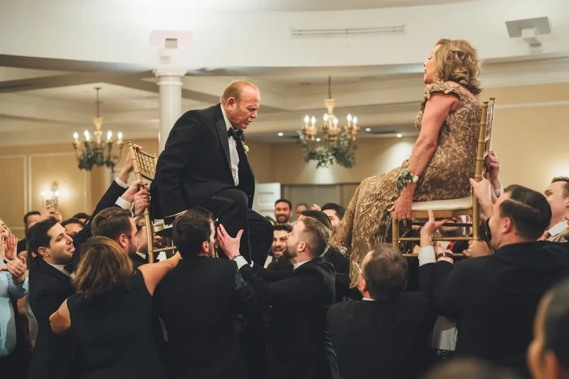 Hora chair lift celebration at River House wedding