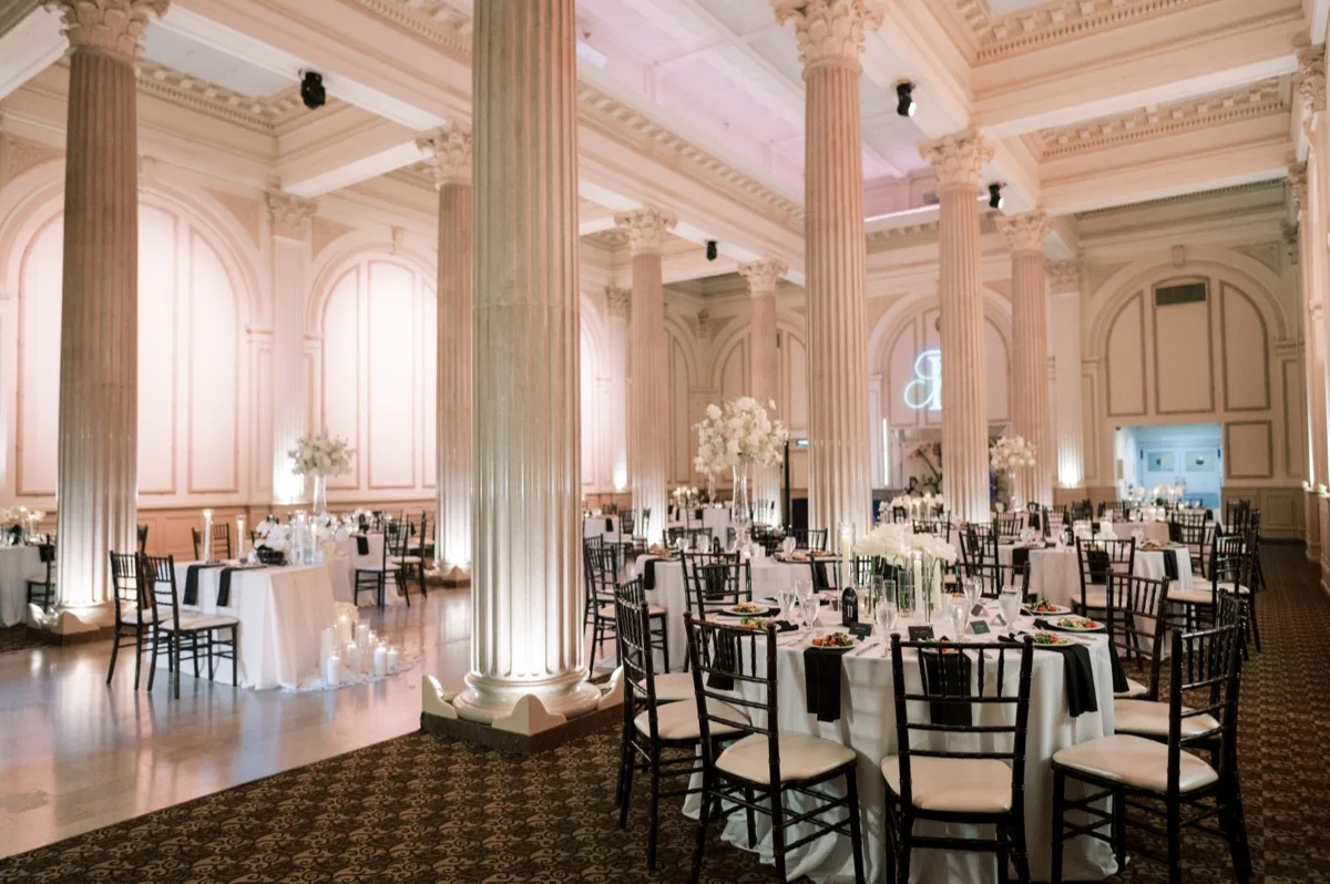 Treasury on the Plaza reception set with candlelit columns ready for wedding