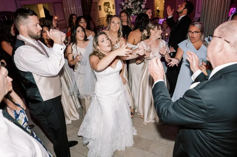 Bride dancing with guests at Treasury wedding